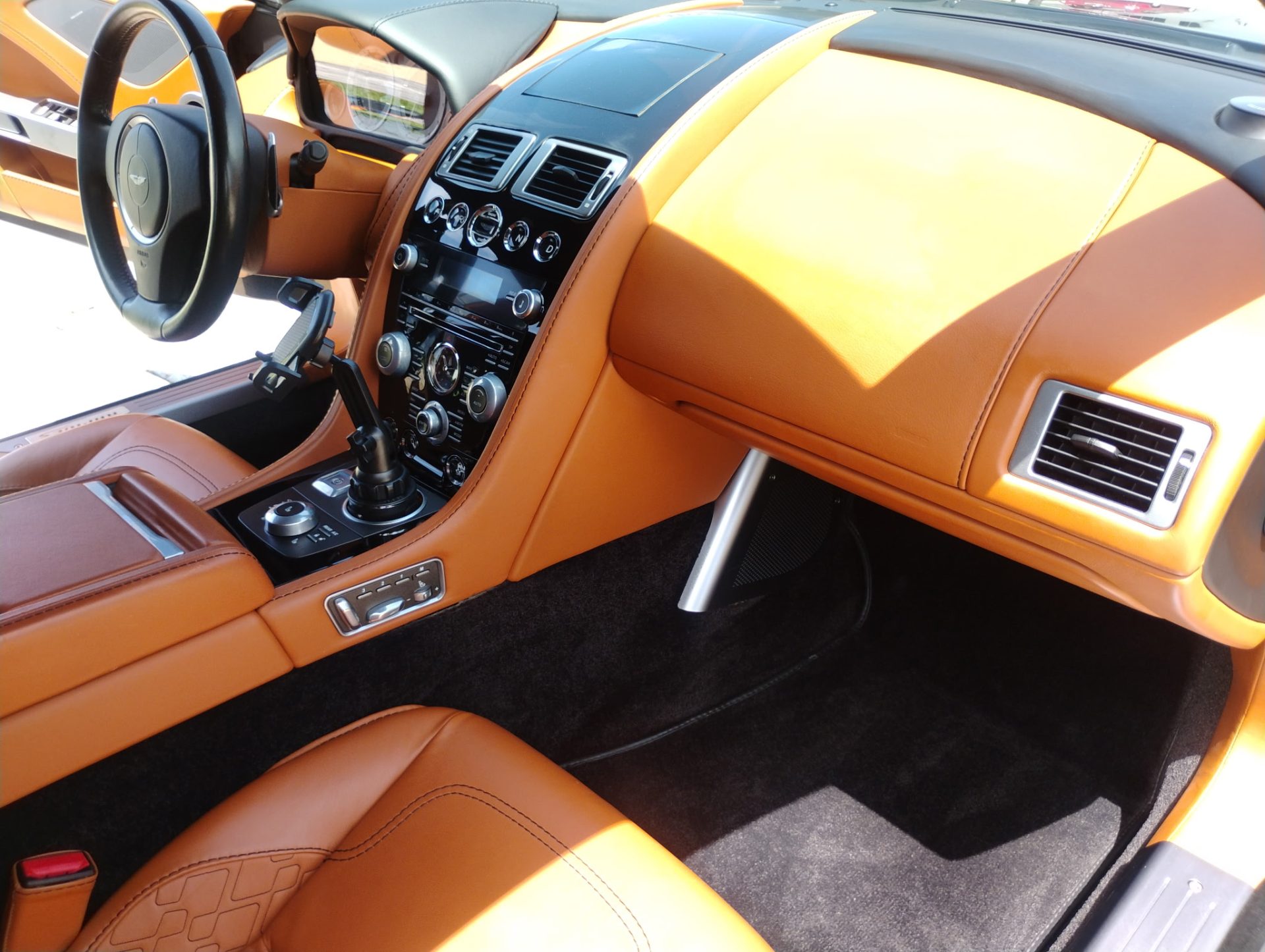 Luxury car interior with orange leather

