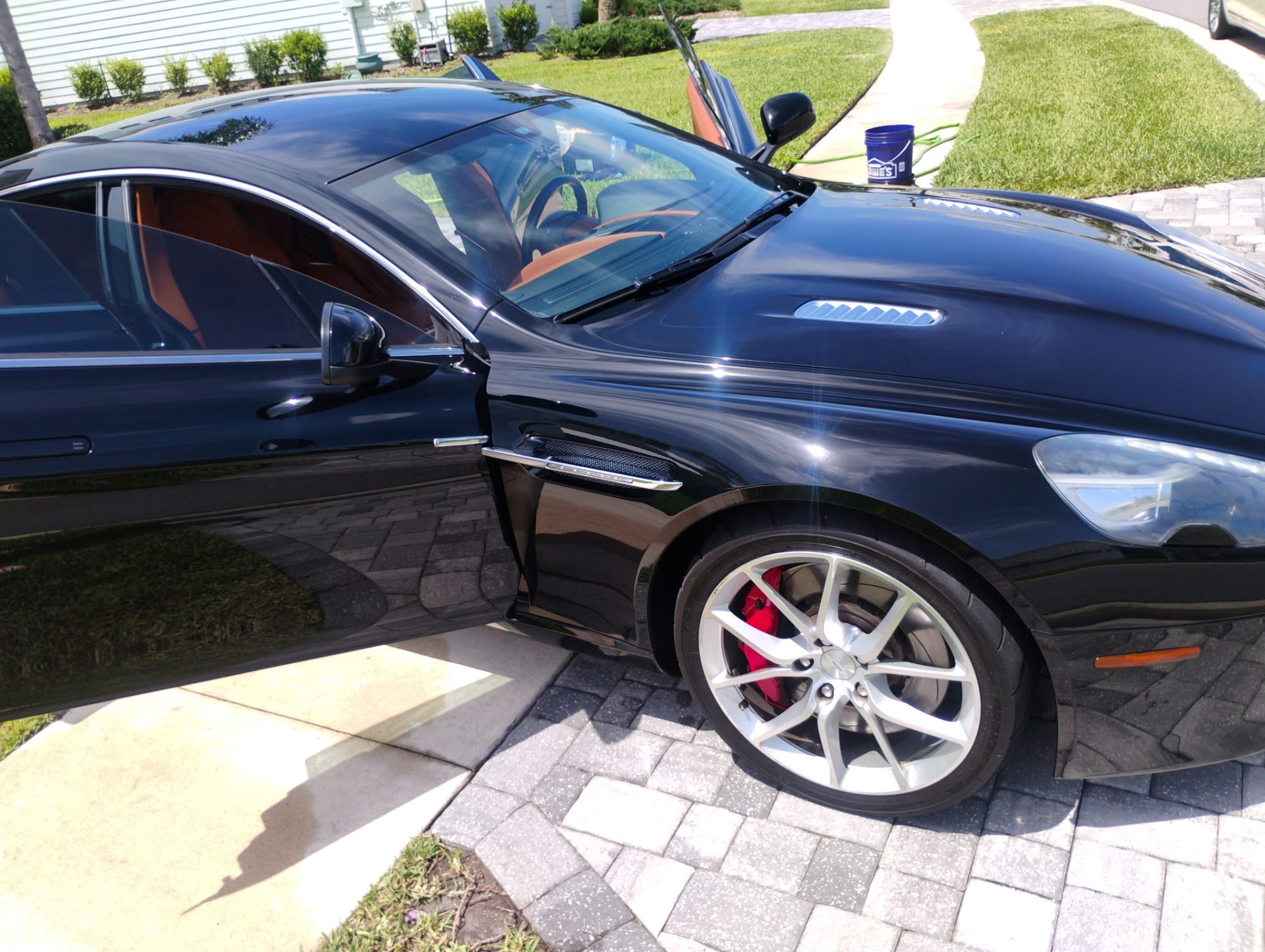 Luxury car with open door

